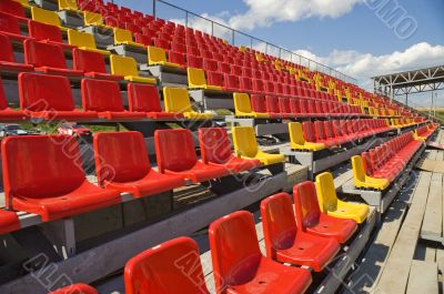 Lines of color seats.