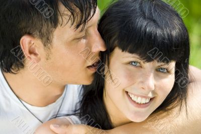 a young couple in the park