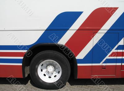 red, blue and white bus