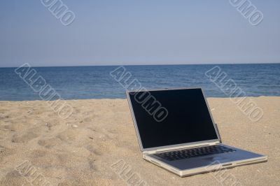 Laptop on beach Laptop on beach