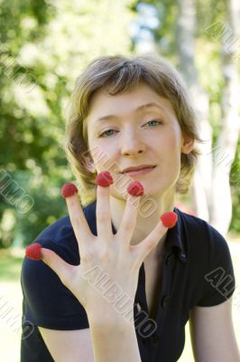 woman with raspberries