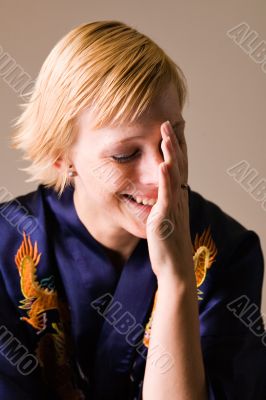 Blond girl with short hair smiling