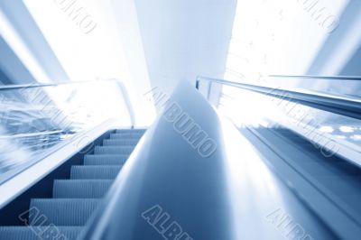 blurred escalator background