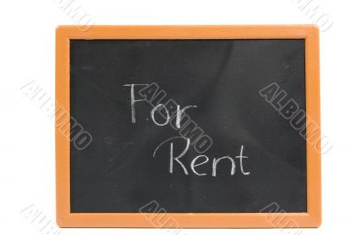 chalkboard with the text for rent