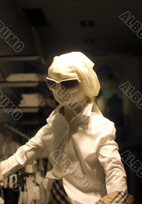 Mannequin with sunglasses and without face Mannequin with sunglasses and without face