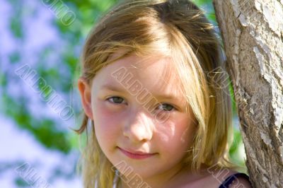 Smiling six year old girl at playground