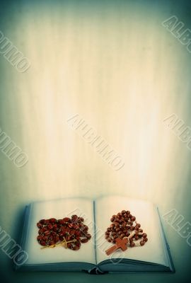 open holy book and rosary open holy book and rosary
