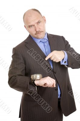 Pointing at his watch Pointing at his watch