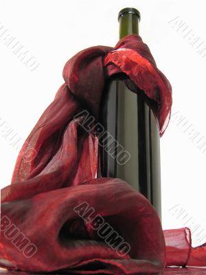 Wine bottle and red scarf