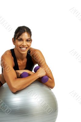 Beautiful brunette woman exercising