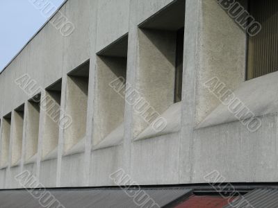concrete building with square windows