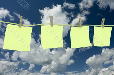 Four clean memo hanging on a cord. 3D image.