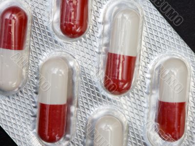 Pills in plastic container