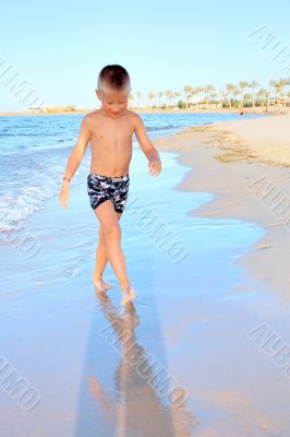 Running on beach in sunset