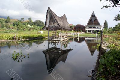 Pond and houses Pond and houses