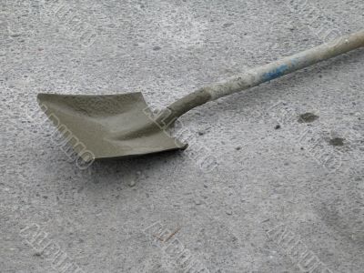 dirty shovel on the ground