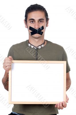 Mute boy holding poster Mute boy holding poster