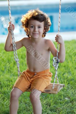 beautiful child in swing