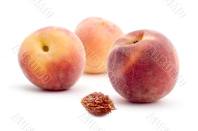 ripe peach on white