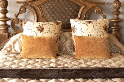 Colorful cushions on the bed