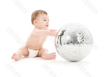 adorable baby boy with big disco ball