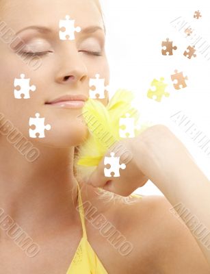 portrait of girl with yellow feathers