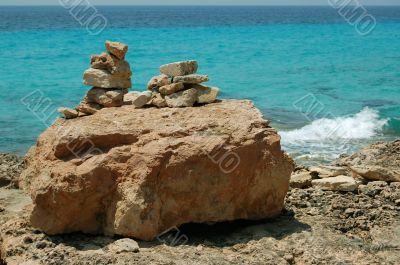 Pile of stones on sea