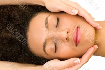 girl receiving head massage