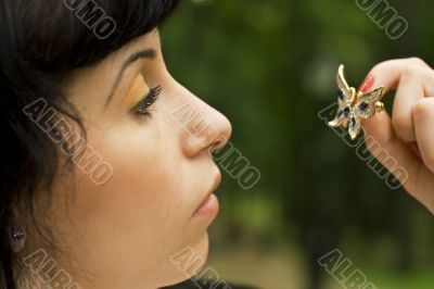 young brunette with brooch