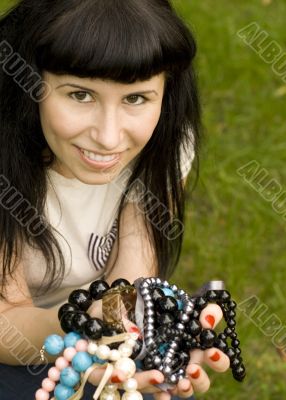 young brunette with beads