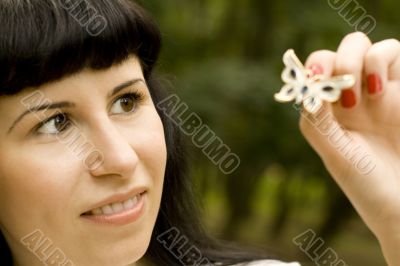 pretty young brunette with brooch