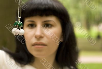 brunette with jewelery cherry