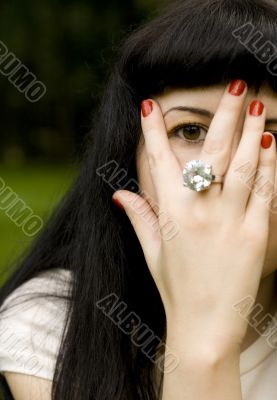  girl covering her face