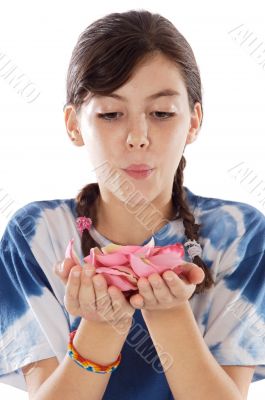 Cute girl blowing petals Cute girl blowing petals