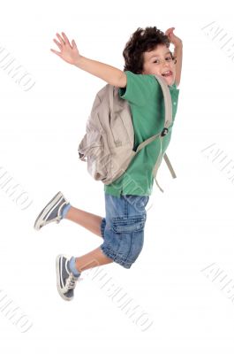 happy child jumping with backpack