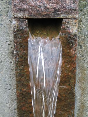 running water through stone