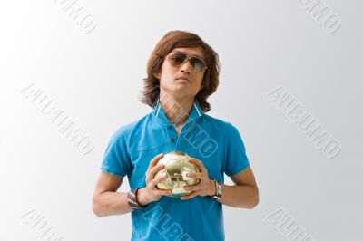 Sporty Asian guy with ball