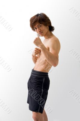 Asian guy in fighting pose