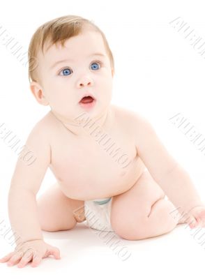 crawling baby boy in diaper