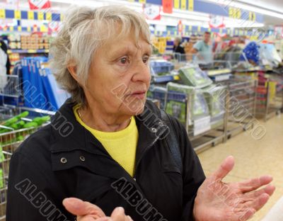 Old woman in a supermarket Old woman in a supermarket