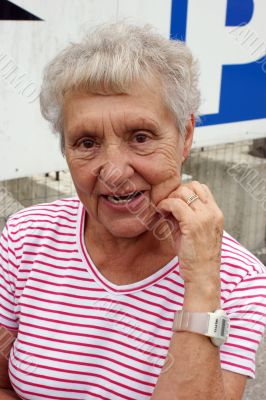 Portrait of a young at heart old woman. Portrait of a young at heart old woman.