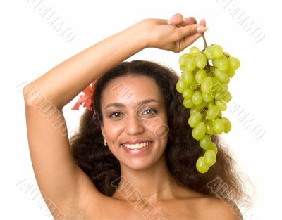 beautiful girl with green grapes