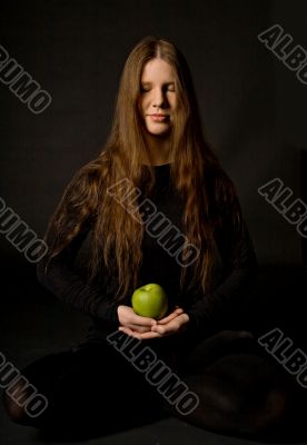 Woman with green apple
