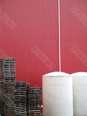 industrial building with palettes and container