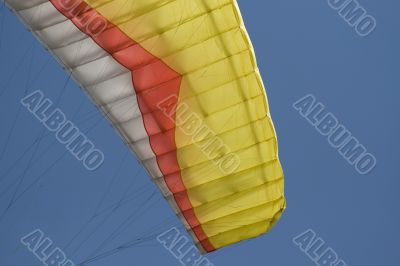Yellow paraglider wing ear