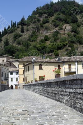 Piobbico, the town and its ancient bridge Piobbico, the town and its ancient bridge