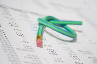 Green rubber pencil twisted into a knot