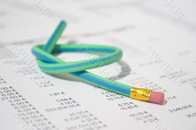 Green rubber pencil twisted into a knot Green rubber pencil twisted into a knot