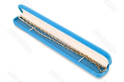 Silver chain on blue box