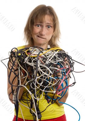 crazy woman with tangle of cables crazy woman with tangle of cables